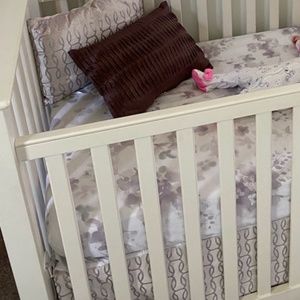 Velvet metallic lattice crib skirt and throw pillow